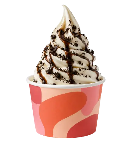 Vanilla soft serve ice cream with chocolate sauce and cookie crumbs